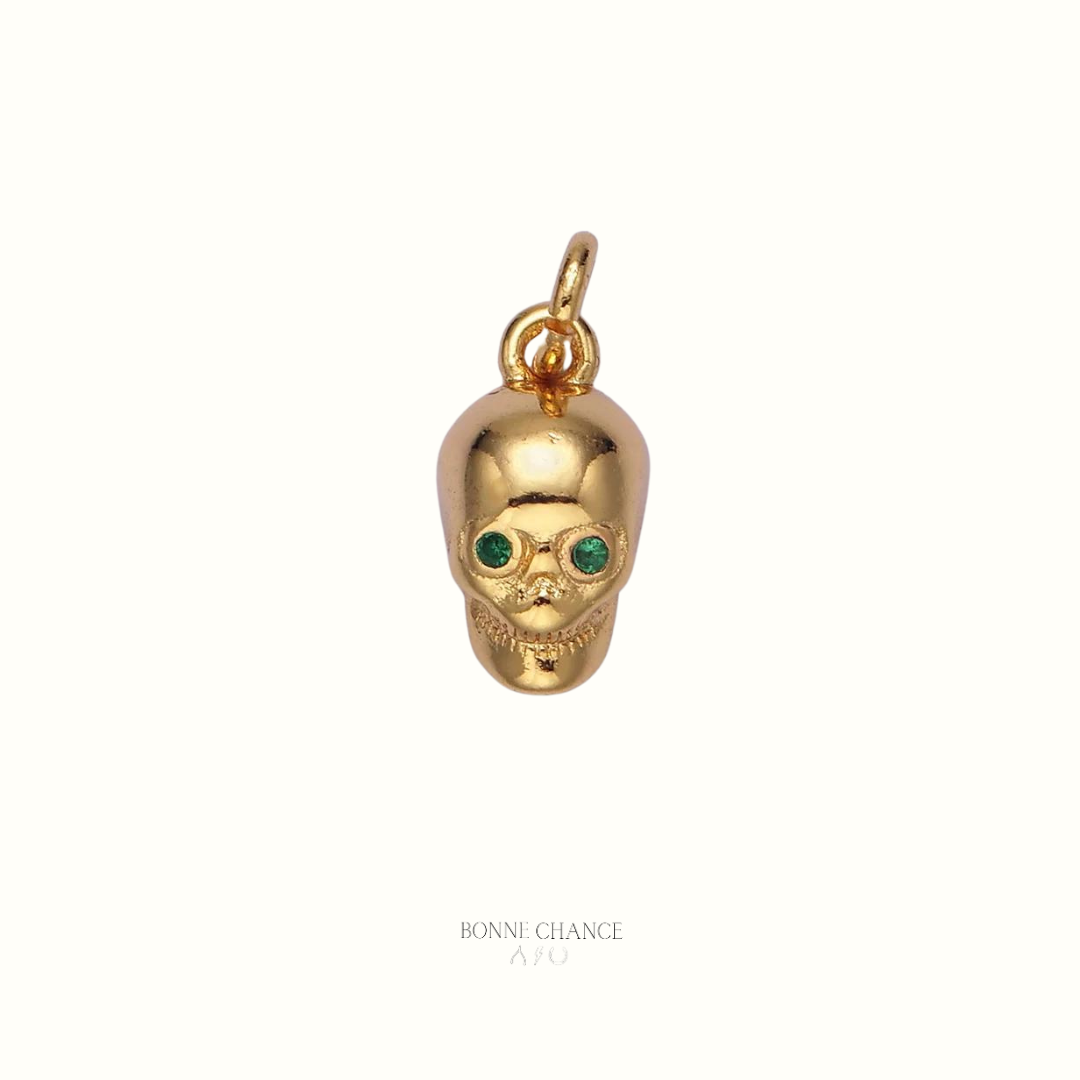 Gold Skull with Emerald Eyes